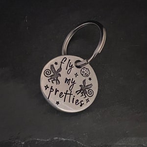 Hand stamped "fly my pretties” flying monkey keychain