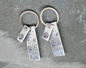 Hand stamped “B!tch and Jerk” supernatural inspired keychain set