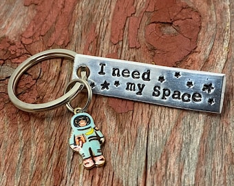 Hand stamped "I need my space" inspired keychain with choice of astronaut charm