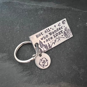 Hand stamped &quot;Not all who wander are lost” keychain with choice of stamped charm charm
