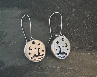 Nessie on a moonlight night hand stamped earrings