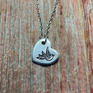 Swallow hand stamped heart necklace