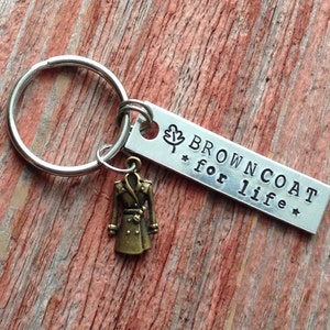 Hand stamped "Browncoat for life" Firefly inspired keychain with coat charm