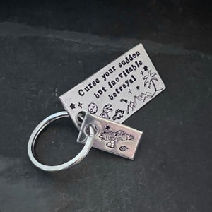 Hand stamped &quot;Curse your sudden but inevitable betrayal&quot; Firefly inspired keychain with serenity charm