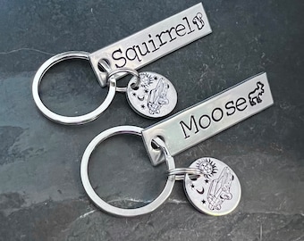 Hand stamped “Squirrel and Moose” supernatural inspired keychain set