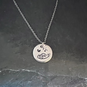 Micro Otter Mama with choice of zodiac constellation hand stamped necklace
