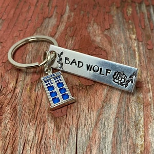 Hand stamped "Bad Wolf" Doctor Who inspired keychain with choice of charm