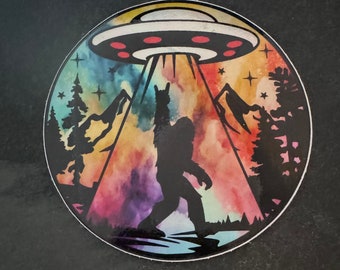 Holographic Bigfoot abduction sunset sticker