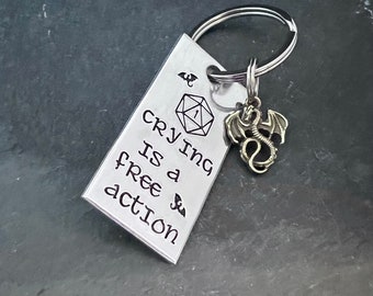 DND inspired “Crying is a free action” hand stamped keychain with a choice of wizard or dragon stamp