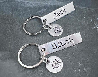 Hand stamped “B!tch and Jerk” supernatural inspired keychain set