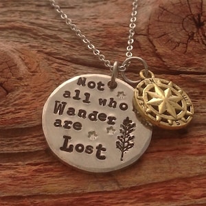 Hand stamped &quot;Not all who wander are lost&quot; necklace with little compass charm.
