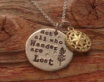 Hand stamped "Not all who wander are lost" necklace with little compass charm.