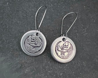 Otter hand stamped earrings