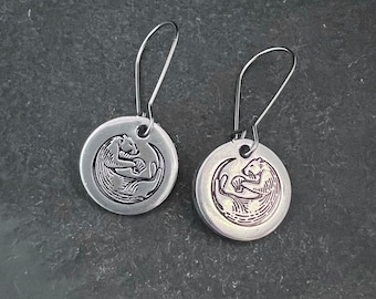 Otter hand stamped earrings