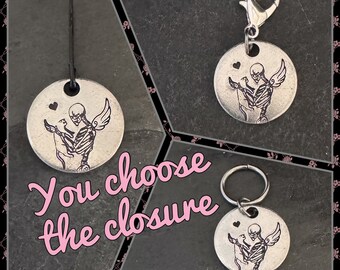 May include: Three silver charm pendants with a black and white image of a skeleton holding a cat. The charms have different closures: a loop, a lobster clasp, and a key ring. "You choose the closure" is written in pink text.