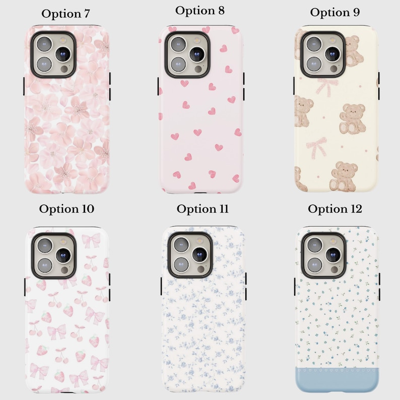 May include: A collection of phone cases with various designs. Options include cases with pink floral patterns, pink hearts, teddy bears, bows and cherries, blue floral patterns, and a blue-bottomed floral design. Each case has a camera cutout.