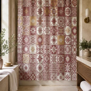 May include: A shower curtain featuring a repeating grid pattern of square tiles in shades of deep red, cream, and muted gold. Each tile displays a unique geometric or floral motif, creating a cohesive mosaic design suspended from a brass rod.