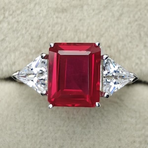 Lab Grown Ruby Ring in 925 Sterling Silver | White Gold Rhodium Plated | 8×10 mm Emerald Cut Ruby | Triangle CZ Three Stone Ring.