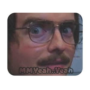 May include: A square coaster featuring a close-up of a man with wide eyes and glasses. The man has a mustache and the text "MMYeah..Yeah" is at the bottom of the coaster.