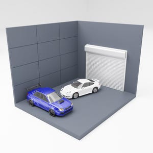 Könnte beinhalten: Ein blaues und ein weißes Sportauto stehen in einer grauen Garage. Die Garage hat ein weißes Rolltor. Die Autos stehen auf einer grauen Oberfläche, mit einer grauen Wand dahinter.