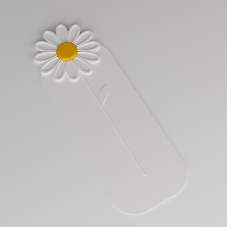 May include: A white rectangular bookmark with rounded corners featuring a raised white daisy flower at the top. The centre of the daisy is a solid yellow circle. A thin, embossed line representing a flower stem with a single leaf extends downwards.