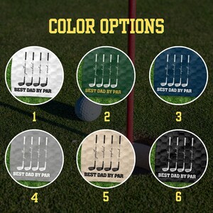 May include: Image showing golf-themed design options. Each design features golf clubs and the text "BEST DAD BY PAR" with names. The designs are on golf balls with different backgrounds, including white, green, and black. The text "COLOR OPTIONS" is at the top.