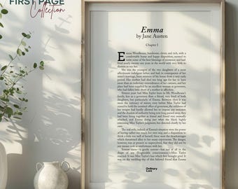 May include: Framed print of the first page of "Emma" by Jane Austen. The text is in black font on an off-white background. The frame is a light wood color. The words "The First Page Collection" are at the top, and "Jane Austen Edition" is at the bottom.