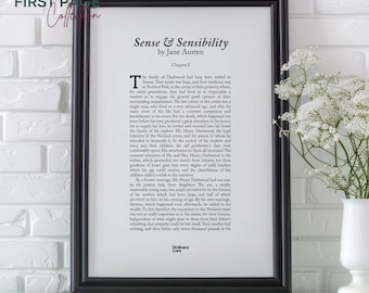 May include: Framed print of the first page of "Sense & Sensibility" by Jane Austen. The text is in black on a white background, with a black frame. The words "JANE AUSTEN EDITION" are at the bottom.