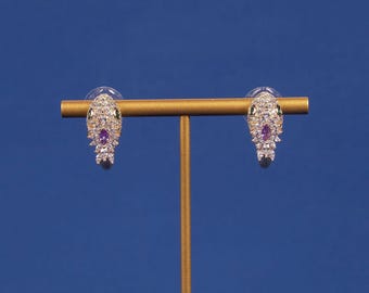 Pendientes de plata 925 con circonitas en forma de serpiente.