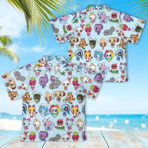 Pode incluir: Duas camisas azuis claras de manga curta com um padrão repetido de personagens de desenhos animados coloridos. Os personagens têm várias formas e designs, incluindo robôs, animais e elementos florais. As camisas são abotoadas e parecem ser feitas de tecido leve.