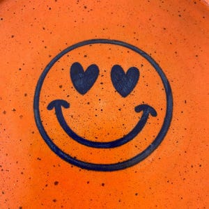 Orange & Navy smiley face ceramic plate
