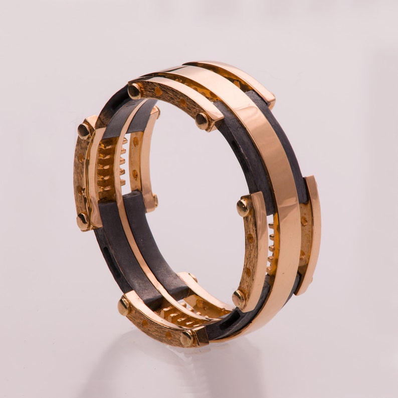 rose gold and silver wedding band        <h3 class=