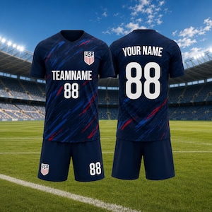 May include: Navy blue soccer uniform set with a V-neck jersey and shorts. The jersey features the USA emblem, team name, and the number 88 in white. The shorts also display the number 88. Red and blue accents are visible on the jersey.