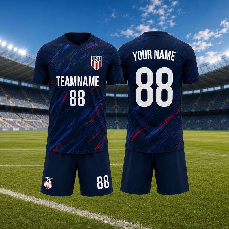 May include: Navy blue soccer uniform set with a V-neck jersey and shorts. The jersey features the USA emblem, team name, and the number 88 in white. The shorts also display the number 88. Red and blue accents are visible on the jersey.