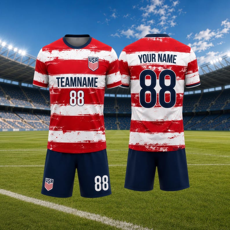 May include: A red and white striped soccer uniform with the text "TEAMNAME" and the number "88" on the front. The shorts are navy blue with the number "88". The back of the jersey has the text "YOUR NAME" and the number "88".