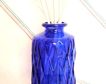 Blue Diffuser Kit with royal blue glass jar, reeds, fragrance