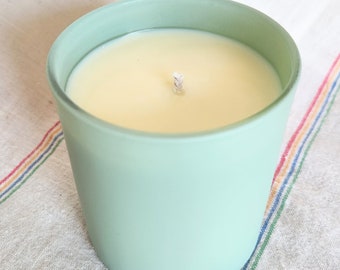 Sage and Citrus scented soy candle in 11 oz teal glass jar with wooden lid