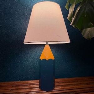 May include: A set of three ceramic mugs with a speckled, matte finish. The mugs are in shades of cream, light gray, and dark gray. Each mug has a simple, modern design and a rounded handle. Perfect for coffee or tea.