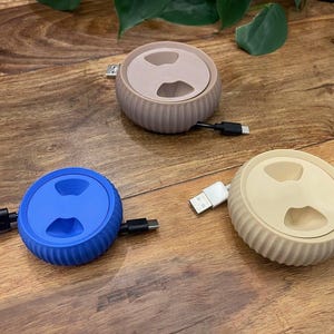 Kabelorganizer mit Aufrollfunktion | Kabelhalter für Kopfhörer und Ladegeräte | Kabelaufbewahrung für unterwegs und zu Hause