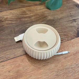 Cable organizer with retractable cable | Cable holder for headphones and chargers | Cable storage for on the go and at home image 2