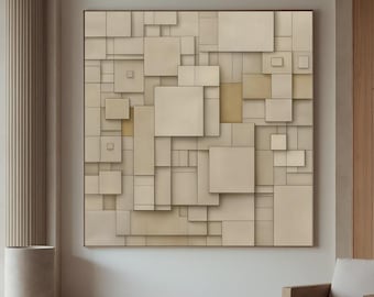 May include: Abstract geometric wall art featuring a layered design of beige and tan squares and rectangles. The artwork is framed and hangs on a neutral-colored wall, complementing the room's minimalist aesthetic. A modern armchair sits below.