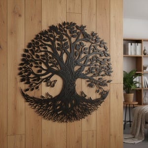 May include: Black metal tree of life wall art with intricate details. The design features a tree with leaves, roots, butterflies, and an owl. The artwork is mounted on a wooden wall, adding a natural touch to the decor.