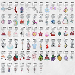 May include: A collection of silver-toned charm pendants with various designs, including a high-heeled shoe, a gun, a flower, a Christmas tree, and a house. Each charm is attached to a keyring. The charms are in a grid pattern.