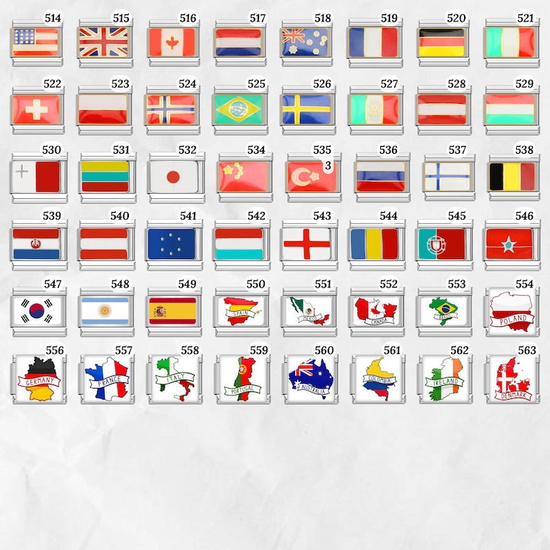 May include: A collection of rectangular charms featuring various national flags. Each charm has a silver border and a colorful enamel design representing a country's flag. The charms are numbered from 514 to 563.