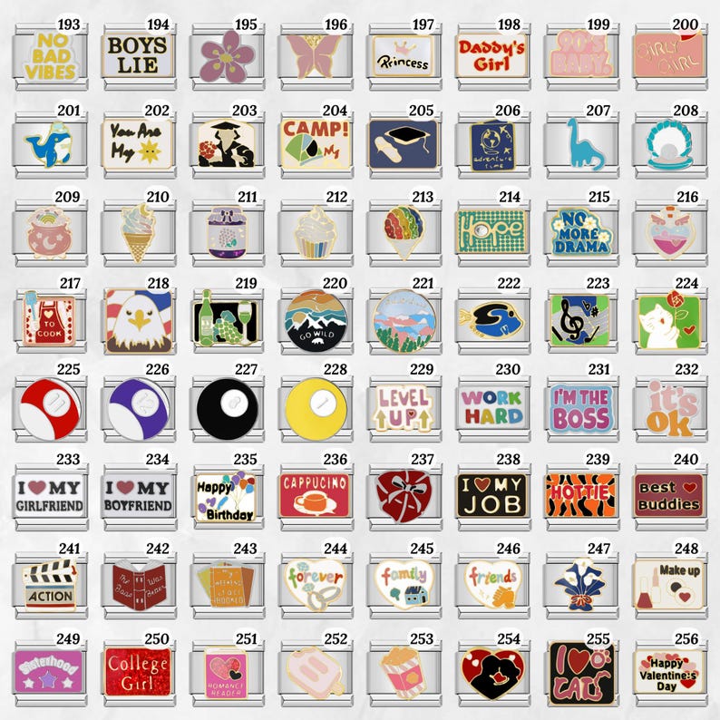 May include: A collection of silver-toned charm pendants with various designs and text. The charms feature images of a butterfly, a dinosaur, a heart, and text like "No Bad Vibes" and "I'm the Boss".