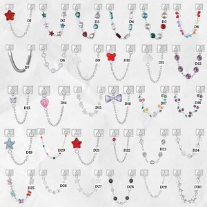 May include: A collection of 30 different decorative chain accessories, each with a unique charm. Charms include stars, hearts, butterflies, and various colorful beads. The chains are silver-toned, and the charms are in various colors.