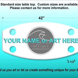 May include: White table top with rounded edges, measuring 42 inches by 20 inches. It has four holes for mounting and a space for a personalized name or art. The text "YOUR NAME or ART HERE" is printed in blue. The logo "Follow Your Wave Designs" is printed in black and gray.