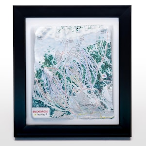 May include: Framed map of Breckenridge ski resort, featuring detailed trails and elevation markers. The map is encased in a white border and a black frame. The TestPlay logo is visible in the lower left corner. The map shows the peaks 6, 7, and 9.