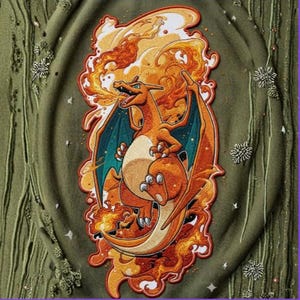 May include: Embroidered patch featuring a Charizard design with orange, yellow, and teal colors, surrounded by flames. The patch is set against a textured olive green background with decorative embellishments.