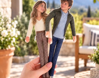 May include: Two flat, doll-like figures representing a young couple. The female figure wears a cream V-neck sweater and brown plaid trousers. The male figure wears a light blue shirt, an olive green button-down overshirt, and dark blue jeans.